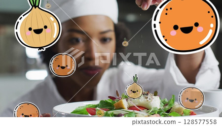 Image of fruit and vegetables icons over african american female chef preparing dish 128577558