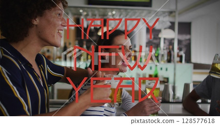 Image of happy new year text over happy diverse friends talking and drinking beer 128577618