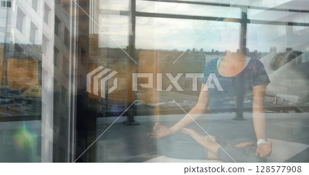 Image of walking people over caucasian woman practicing yoga and meditating 128577908