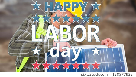 Image of happy labor day text and stars over caucasian worker holding solar panel 128577922