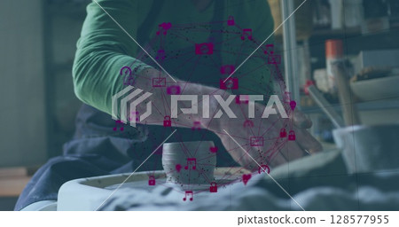 Image of network of connections with icons over caucasian woman doing pottery 128577955