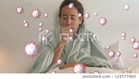 Image of virus cells over caucasian woman taking pills 128577960