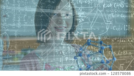 Image of mathematical equations over smiling caucasian schoolgirl with models in classroom 128578086