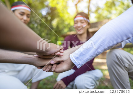 Portrait of an Indonesian southeast asian people celebrate Indonesia Independence Day on the 17th of August. Concept of Kemerdekaan Indonesia 128578655