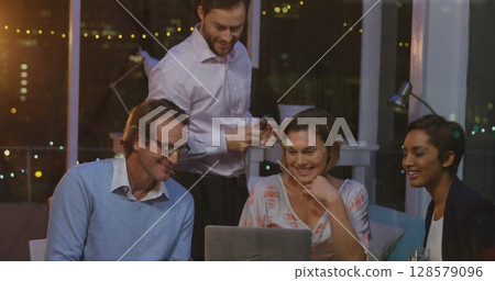 Image of financial data processing over diverse business people 128579096