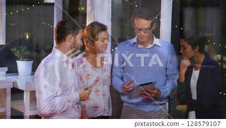 Image of financial data processing over diverse business people 128579107