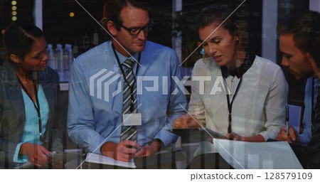 Image of financial data processing over diverse business people Image of financial data processing over diverse business people 128579109