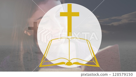 Image of bible icon over caucasian woman reading bible 128579150