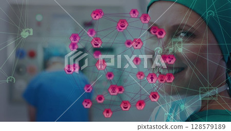 Image of network of connections with icons over smiling caucasian female surgeon 128579189