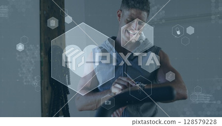 Image of medical and health icons over caucasian man exercising in gym Image of medical and health icons over caucasian man exercising in gym 128579228