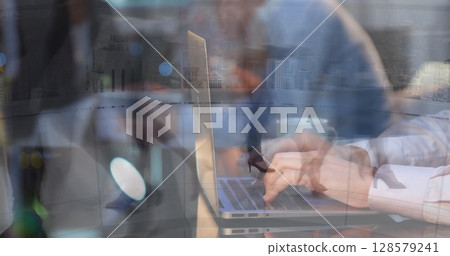 Image of caucasian woman using laptop over people walking 128579241