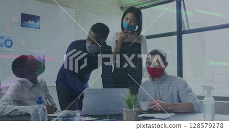 Image of data processing over diverse business people with face masks using laptop 128579278