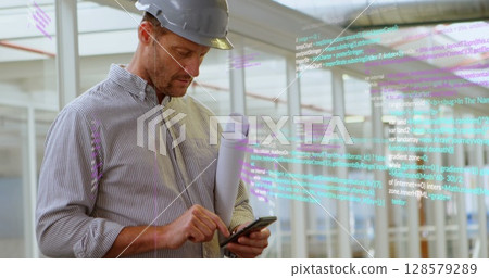 Image of data processing over caucasian male worker using smartphone 128579289