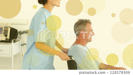 Image of asian female nurse smiling with patient over spots Image of asian female nurse smiling with patient over spots 128579309