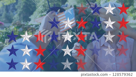 Image of stars over happy caucasian family waving american flags Image of stars over happy caucasian family waving american flags 128579362