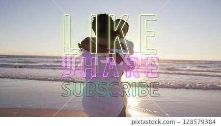 Image of like text over african american couple at beach 128579384