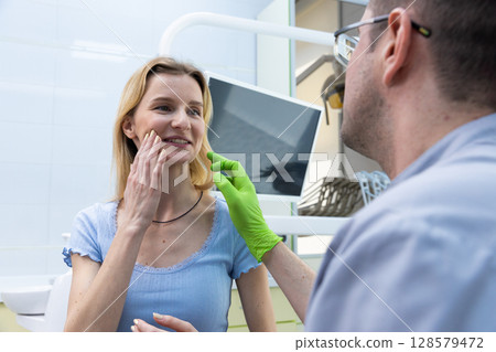 A Patient Consultation in a Modern Dental Practice The Interaction Between a Dentist and Patient with a Focus on Care and Comfort in a Professional Setting 128579472