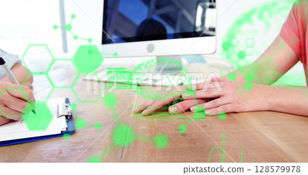 Image of scientific data processing over hands of caucasian female doctor and patient 128579978