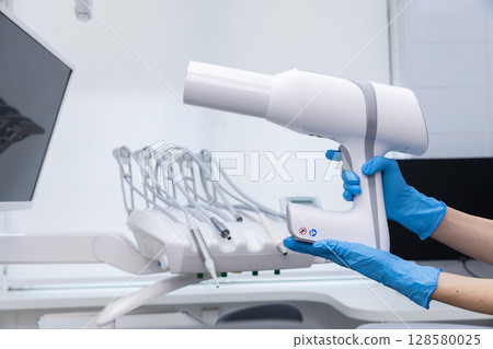Advanced Dental Imaging Equipment: A Modern Handheld X-Ray Device for Precise Diagnosis in Dental Clinics and Practices Advanced Dental Imaging Equipment: A Modern Handheld X-Ray Device for Precise Diagnosis in Dental Clinics and Practices 128580025