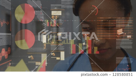 Image of financial data over biracial female doctor Image of financial data over biracial female doctor 128580851