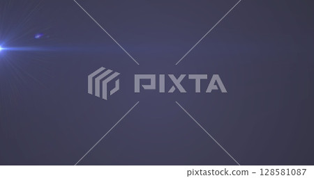 Image of glowing spots of lights over dark background 128581087