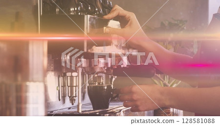 Image of glowing moving lights over coffee machine 128581088