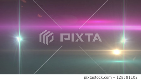 Image of glowing spots of lights over dark background 128581102