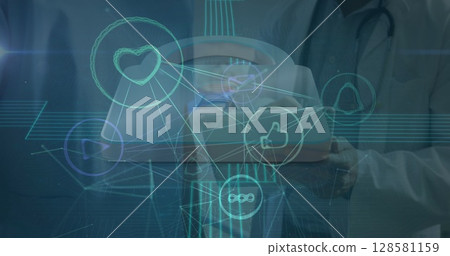 Image of network of connections with icons over diverse doctors 128581159