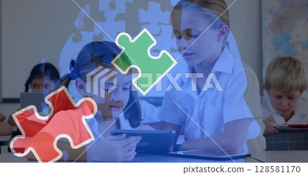 Image of puzzle pieces over diverse schoolchildren using tablet Image of puzzle pieces over diverse schoolchildren using tablet 128581170