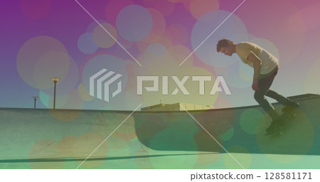 Image of colourful spots over caucasian man skateboarding Image of colourful spots over caucasian man skateboarding 128581171