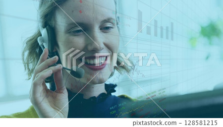 Image of financial graphs over happy caucasian female consultant working in office 128581215