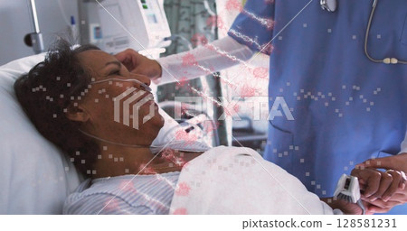 Image of dna rotating over diverse female doctor and patient 128581231