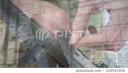 Image of women using gun over businessmen Image of women using gun over businessmen 128581956