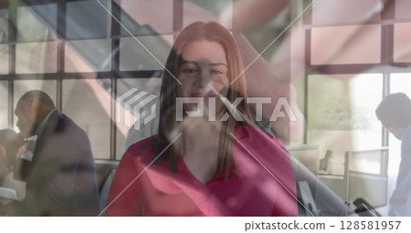 Image of women using computer over caucasian businesswomen 128581957