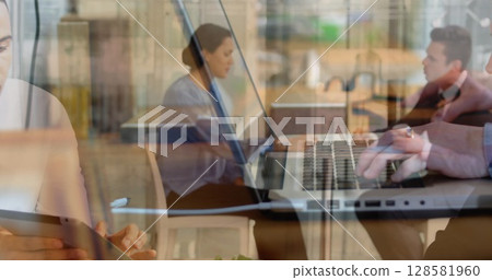 Image of men using computer over diverse business people Image of men using computer over diverse business people 128581960