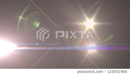 Image of glowing light moving over dark grey background 128581988