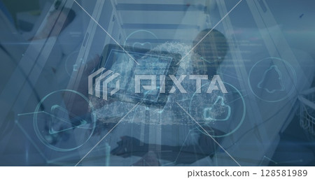 Image of digital cloud and icons over caucasian male doctor with tablet Image of digital cloud and icons over caucasian male doctor with tablet 128581989