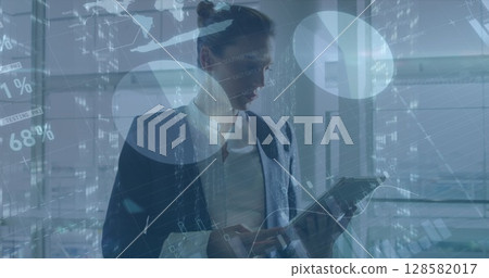 Image of data processing over caucasian businesswoman using tablet Image of data processing over caucasian businesswoman using tablet 128582017