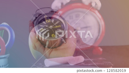 Nimation of clock over hand holding clock Nimation of clock over hand holding clock 128582019