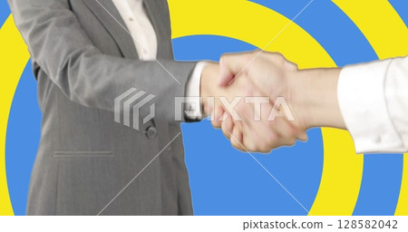 Image of caucasian business people shaking hands over flag of ukraine 128582042