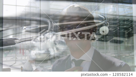 Image of stethoscope on the keyboard over businessmen 128582114