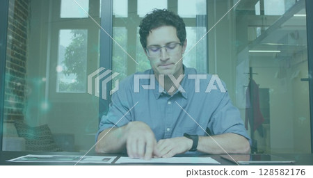 Image of glowing light over caucasian businessman 128582176