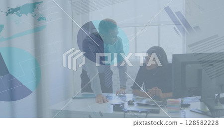 Image of financial data processing over two diverse business people 128582228