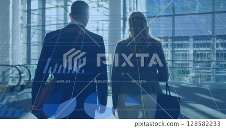 Image of financial data processing over two diverse business people 128582233