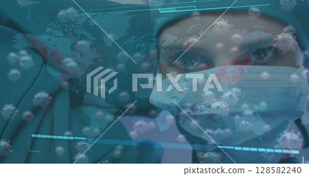 Displaying health worker wearing surgical mask scrub cap in digital panel with virus icons and map Displaying health worker wearing surgical mask scrub cap in digital panel with virus icons and map 128582240