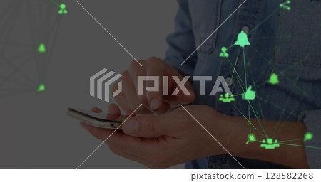 Image of network of connections over hands of caucasian businessman using smartphone Image of network of connections over hands of caucasian businessman using smartphone 128582268