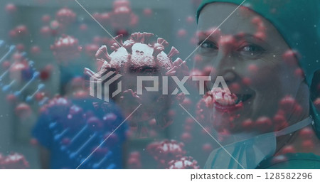 Smiling surgeon in surgical cap, gown in hospital, with virus particles and DNA strands, copy space Smiling surgeon in surgical cap, gown in hospital, with virus particles and DNA strands, copy space 128582296