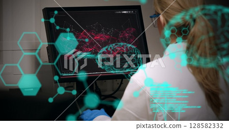 Image of scientific data over caucasian female lab worker using computer 128582332