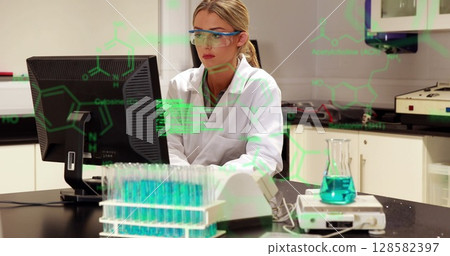 Image of scientific data processing over caucasian female lab worker using computer 128582397