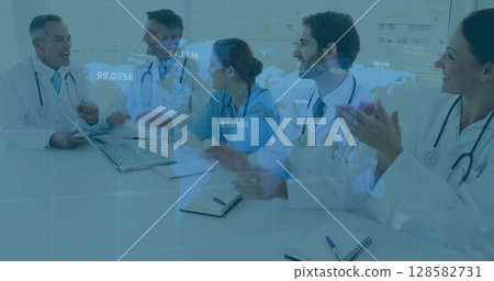 Image of data processing over diverse group of doctors Image of data processing over diverse group of doctors 128582731